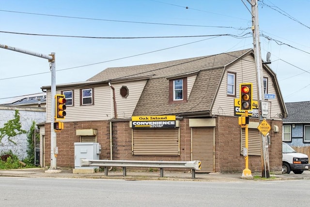 831 N Shore Rd, Revere, MA 02151 - townhome / multi-family property with a shingled roof and a gambrel roof