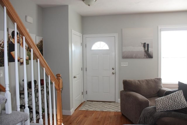 foyer with light hardwood / wood-style floors