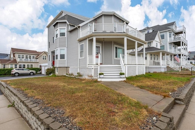 view of front facade with a porch and a front yard