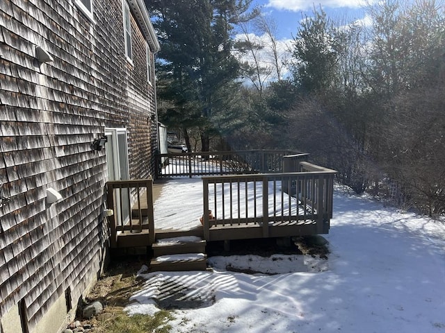 view of snow covered deck