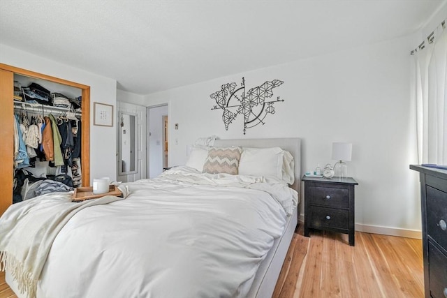 80 Main St Unit 20, Malden, MA 02148 - bedroom with light wood-style flooring and a closet