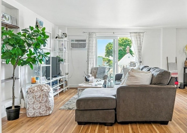 80 Main St Unit 20, Malden, MA 02148 - living room featuring wood finished floors and an AC wall unit