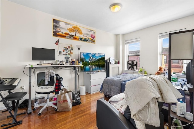 bedroom featuring wood finished floors