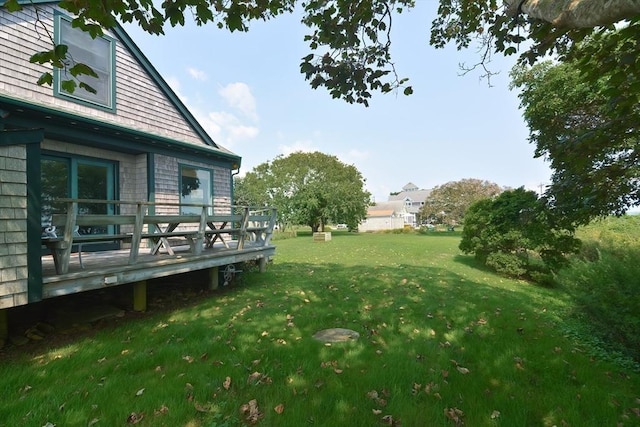 view of yard featuring a deck