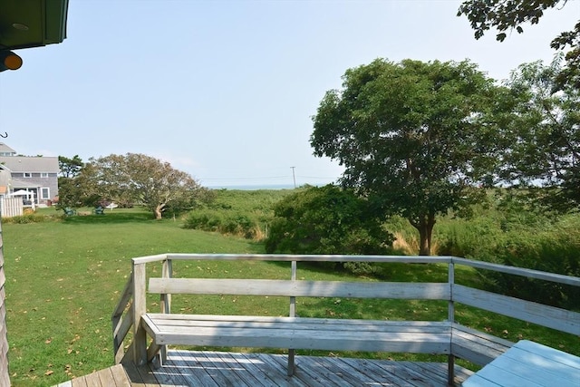 deck featuring a yard