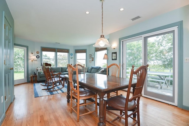 dining room featuring light hardwood / wood-style floors