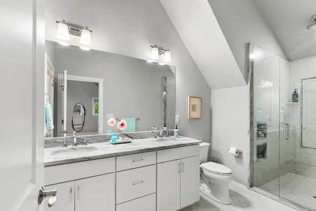 38 Paul Revere Rd, Lexington, MA 02421 - full bathroom with a shower stall, double vanity, lofted ceiling, and toilet