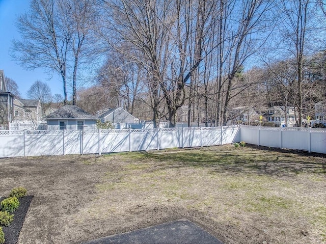 view of yard featuring a fenced backyard