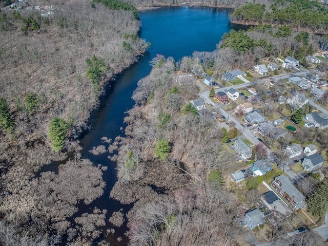 drone / aerial view with a water view and a residential view