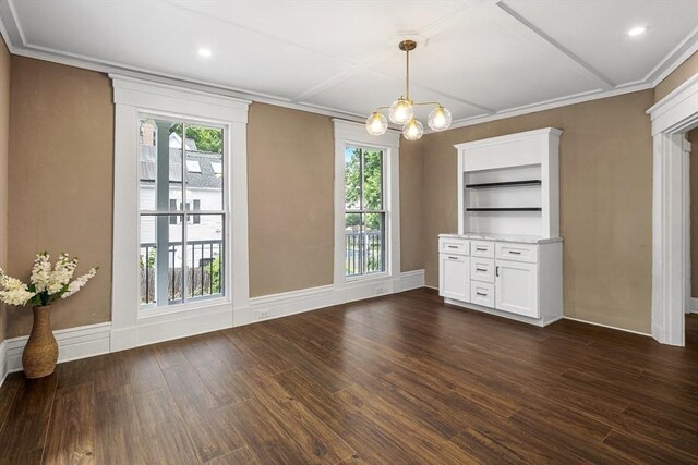 186 Chapel St, Abington, MA 02351 - unfurnished dining area featuring healthy amount of natural light, dark wood-style flooring, a chandelier, ornamental molding, and recessed lighting