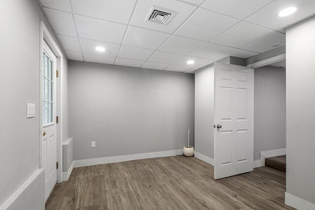 186 Chapel St, Abington, MA 02351 - empty room with wood finished floors, baseboards, a paneled ceiling, and recessed lighting