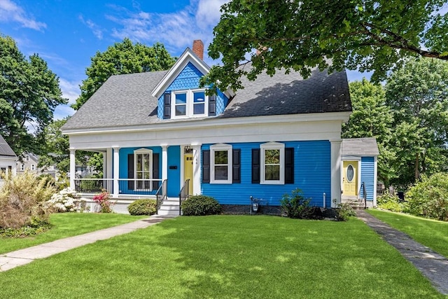 186 Chapel St, Abington, MA 02351 - view of front of property with a front lawn, a porch, a chimney, and a shingled roof