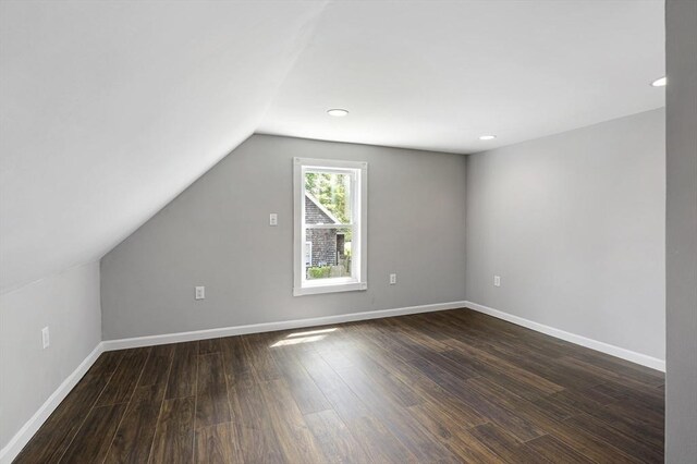 186 Chapel St, Abington, MA 02351 - bonus room featuring vaulted ceiling, dark wood finished floors, recessed lighting, and baseboards