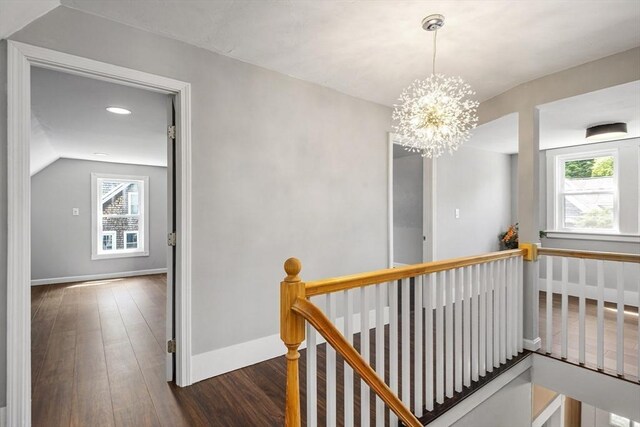 186 Chapel St, Abington, MA 02351 - hall with an upstairs landing, wood finished floors, a chandelier, baseboards, and vaulted ceiling
