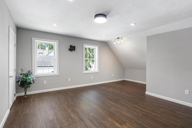 186 Chapel St, Abington, MA 02351 - additional living space with dark wood-style floors, baseboards, vaulted ceiling, and recessed lighting