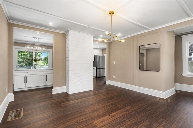 186 Chapel St, Abington, MA 02351 - unfurnished living room with a chandelier, baseboards, dark wood-style floors, crown molding, and recessed lighting