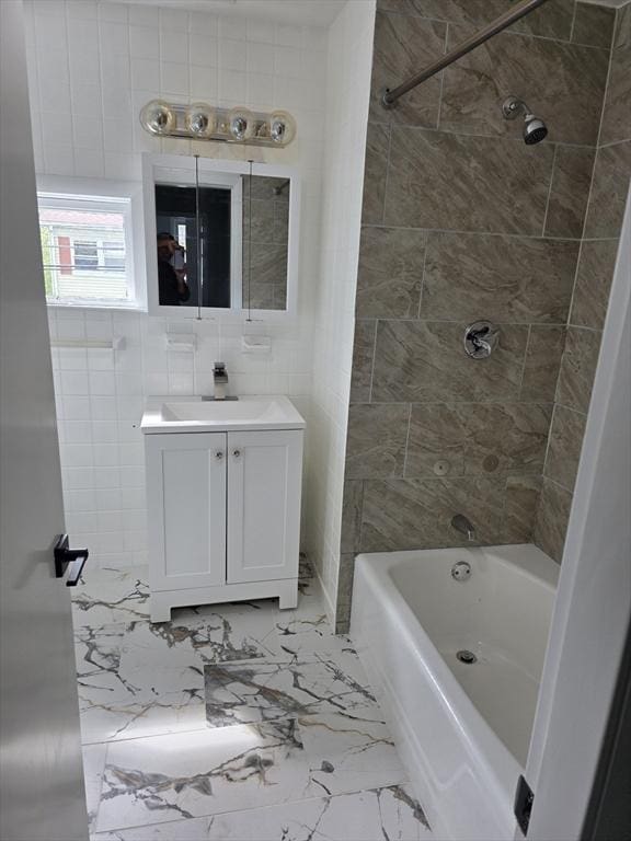 32 Central Ave, Everett, MA 02149 - bathroom with vanity,  shower combination, marble finish floors, and tile walls