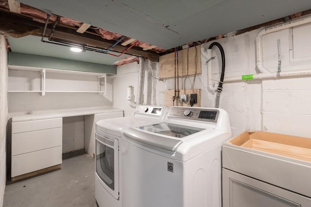 clothes washing area with laundry area and washing machine and dryer