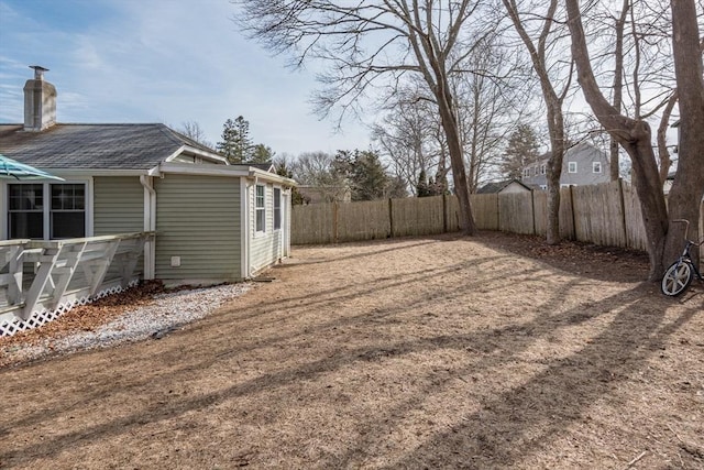 view of yard featuring a fenced backyard