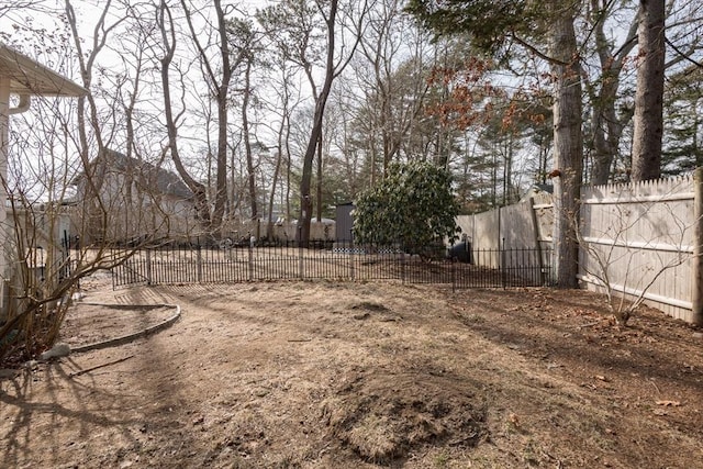 view of yard with a fenced backyard