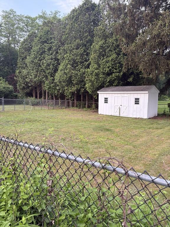 945 Shoemaker Ln, Agawam, MA 01030 - view of yard featuring a shed