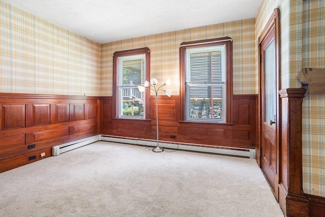 14 Franklin Ter, Boston, MA 02136 - spare room featuring a wainscoted wall, carpet flooring, wallpapered walls, and baseboard heating