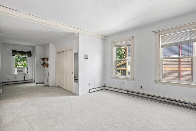 14 Franklin Ter, Boston, MA 02136 - empty room featuring healthy amount of natural light, light colored carpet, and a baseboard radiator