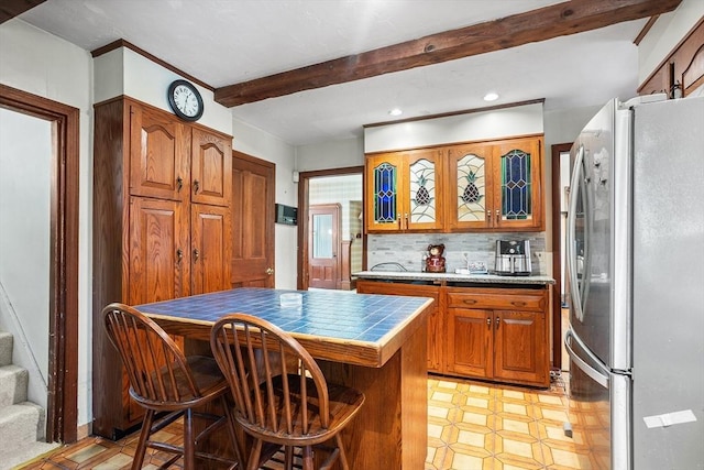 14 Franklin Ter, Boston, MA 02136 - kitchen with freestanding refrigerator, beamed ceiling, light floors, brown cabinets, and glass insert cabinets