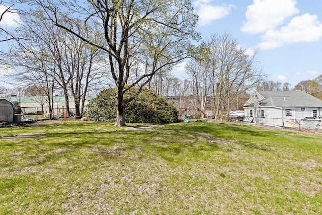 view of yard with fence