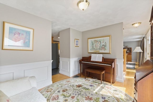 2 Spencer Way, Merrimac, MA 01860 - living area with light wood-style flooring and wainscoting