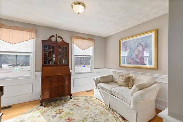 2 Spencer Way, Merrimac, MA 01860 - sitting room with a wainscoted wall, wood finished floors, and visible vents