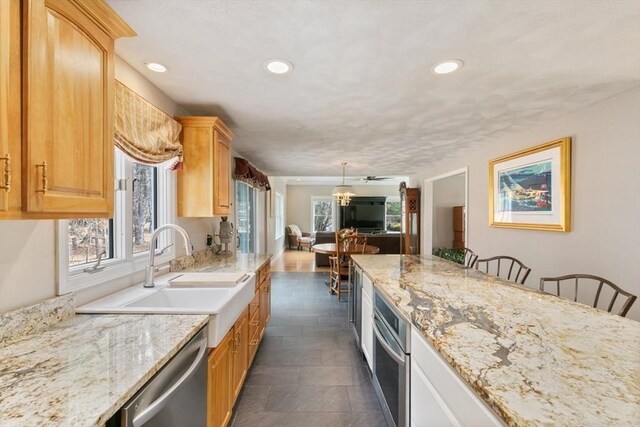 2 Spencer Way, Merrimac, MA 01860 - kitchen featuring a sink, stainless steel appliances, recessed lighting, and light stone counters