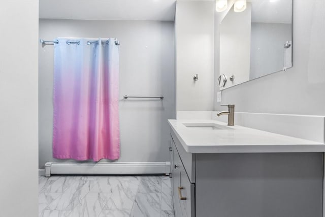 full bathroom with baseboards, marble finish floor, baseboard heating, and vanity