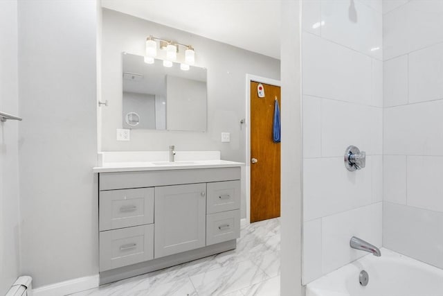full bath featuring vanity, marble finish floor, a baseboard radiator, and shower / tub combination