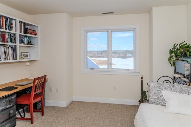 bedroom with light carpet