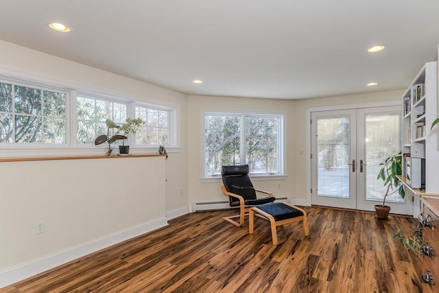 living area with french doors and dark hardwood / wood-style floors