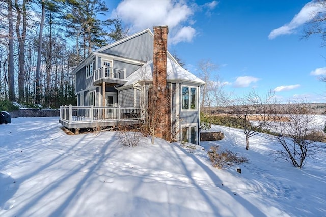 view of front of home featuring a deck and a balcony