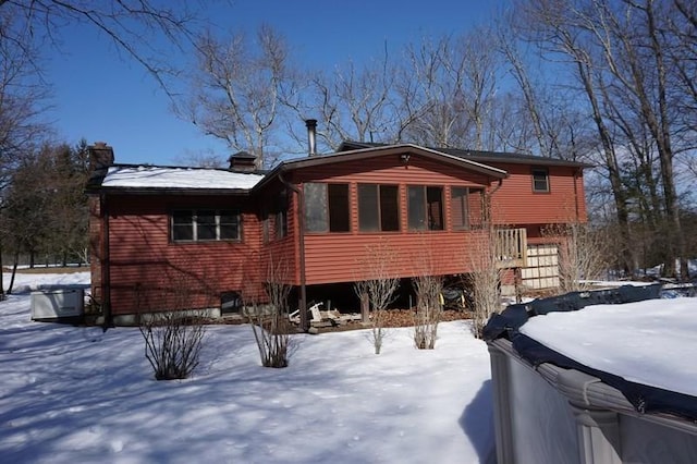 view of snow covered property