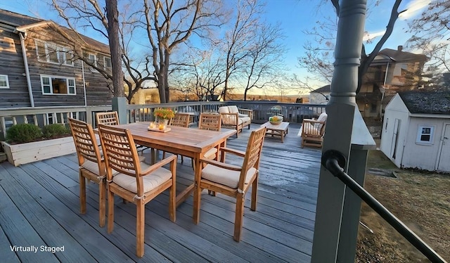 deck with an outdoor structure