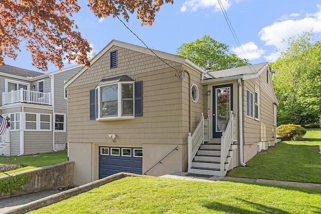 68 Spring Rd, Nahant, MA 01908 - view of front of property with an attached garage and a front yard