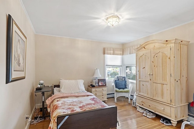 68 Spring Rd, Nahant, MA 01908 - bedroom with light wood-style floors and crown molding