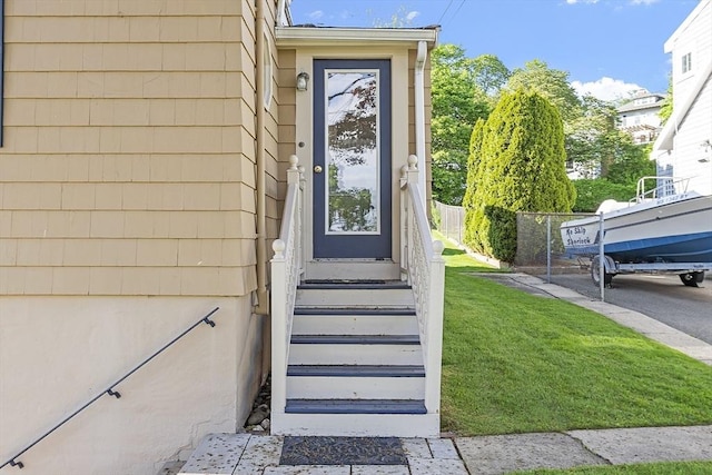 68 Spring Rd, Nahant, MA 01908 - doorway to property featuring a yard