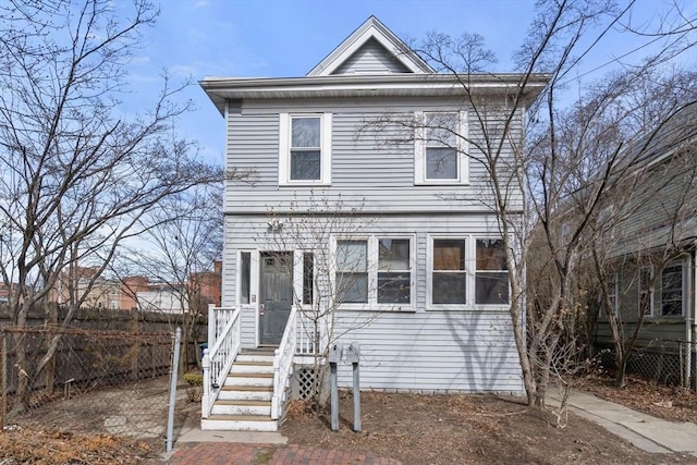 view of front of property with fence