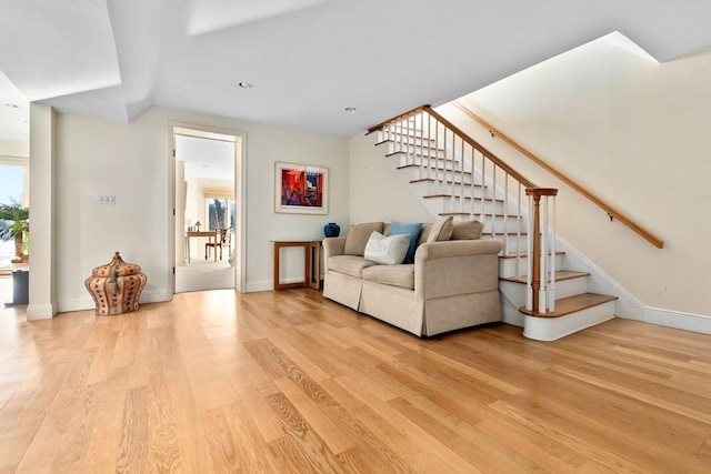 18 Hawkswood Ests Unit 18, Amesbury, MA 01913 - living area featuring baseboards, stairs, and light wood finished floors