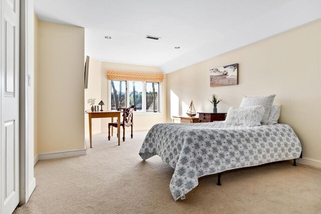 18 Hawkswood Ests Unit 18, Amesbury, MA 01913 - carpeted bedroom with lofted ceiling, visible vents, and baseboards