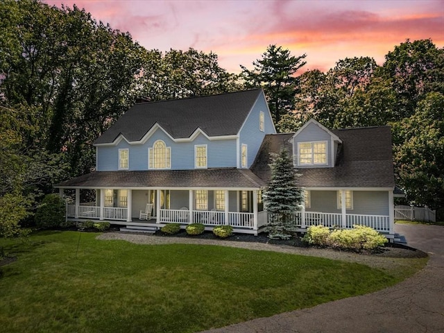 12 Coombs Cir, Newburyport, MA 01950 - view of front of house featuring covered porch and a front lawn