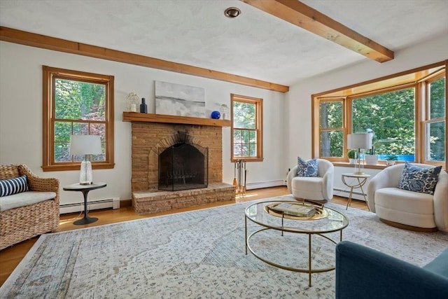 12 Coombs Cir, Newburyport, MA 01950 - living room with a baseboard heating unit, beam ceiling, and plenty of natural light