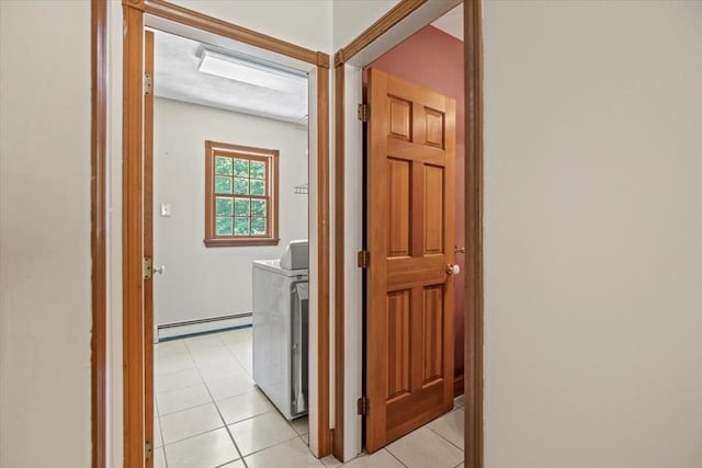 12 Coombs Cir, Newburyport, MA 01950 - hallway with a baseboard heating unit, light tile patterned floors, and independent washer and dryer