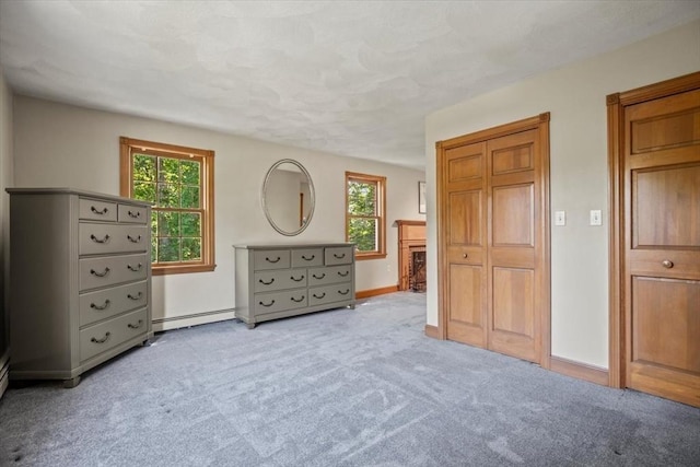 12 Coombs Cir, Newburyport, MA 01950 - bedroom with multiple windows, carpet, and a baseboard heating unit