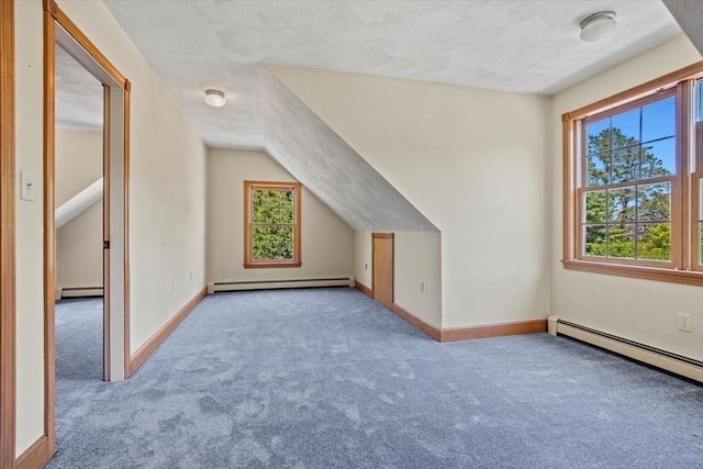 12 Coombs Cir, Newburyport, MA 01950 - additional living space with a baseboard heating unit, a baseboard radiator, carpet flooring, baseboard heating, and vaulted ceiling